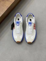 Dolce & Gabbana Mixed-material DG Cushion Sneakers In White and Red